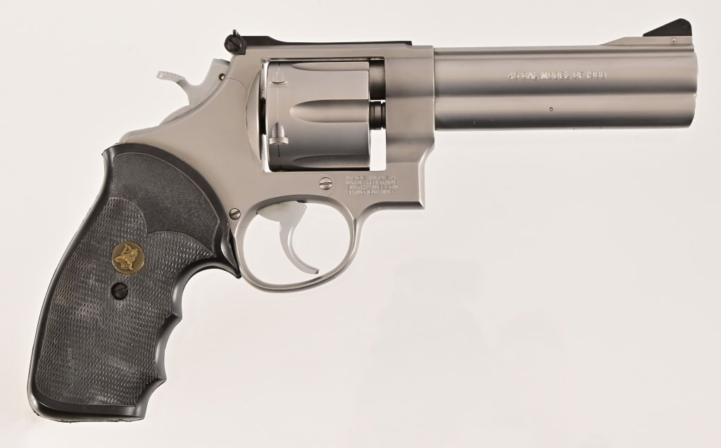 S&W Model 1988 Revolver .45 ACP: 5" barrel. Pachmayr grips, standard trigger and hammer, Very good condition. S/N BDC6863. Modern