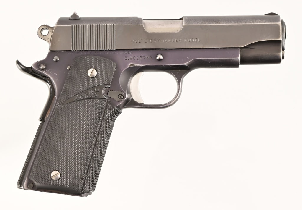 Colt Commander 1911 Semi-Auto .45ACP: S/N CLW037753. 4" barrel, good bore. Good condition with minor wear. Modern.