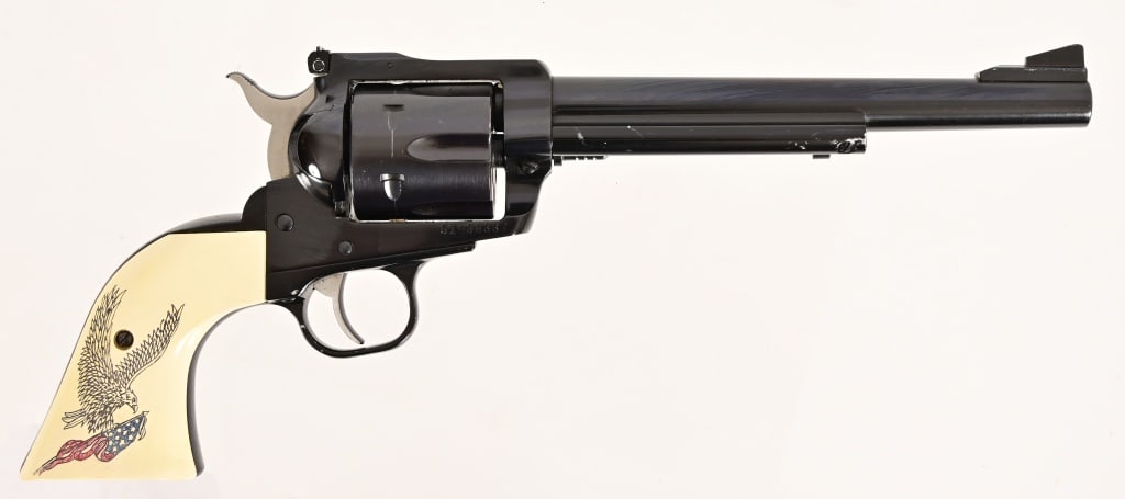 Ruger New Model Blackhawk .30 Carbine: 7.5" barrel, tight action. Nice finish with only slight loss on ejector housing. Replacement grips with flag and eagle. S/N 51-38337. Modern.