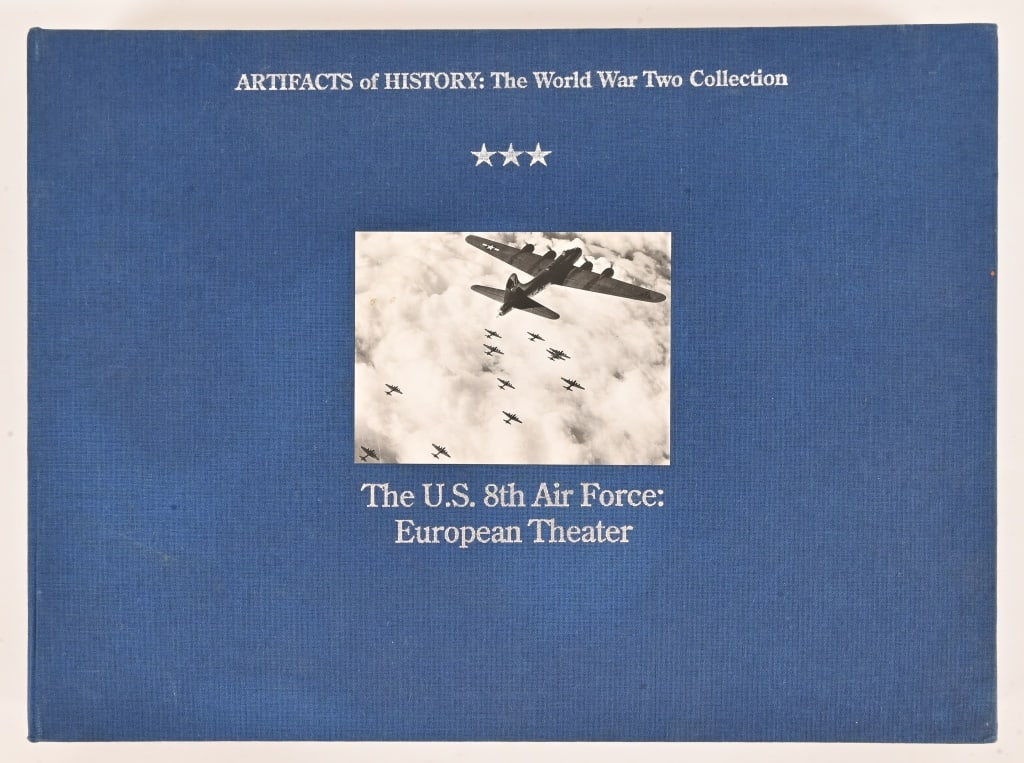 WWII U.S. 8th Air Force European Theatre Artifacts: Tri fold book that includes Third Reich Postage Stamps, piece of B-17 bomber that crashed down near the village of Prenden, shoulder patch of the U.S. 8th Air Force, and piece of ribbon used to suspen