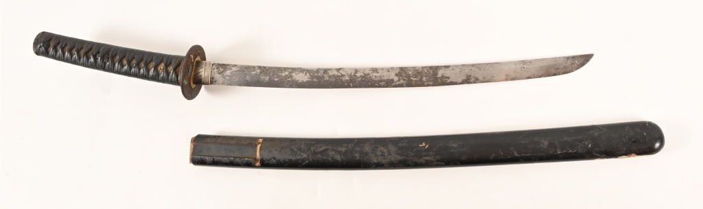 Antique Japanese Samurai Short Sword: With scabbard. Guard is loose. Blade measures 18 1/4", overall length 28 1/4" .