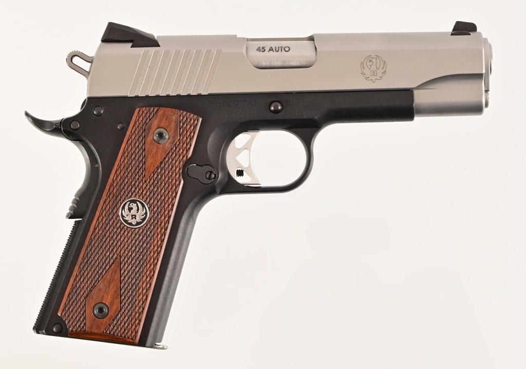 Ruger SR1911 Semi-Auto .45ACP: S/N 673-53287. Like new in original box.Commander size with 4 1/8" barrel. Modern