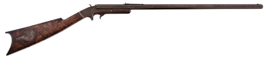 Rare Myron & Moses .44 Rimfire Rifle: Moses Patent Breach-load breakover single shot rifle. Figured curly maple stock, 28.25" barrel. Action works but hammer is broken. Antique Very few made with only a few example known to exist.