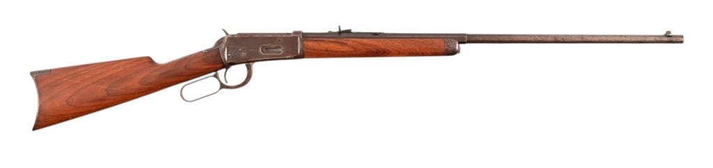 Winchester 1894 .38-55 Lever Action Rifle: SN 50308. Early model made in 1898. Half-Octagonal, half-round 24" barrel. Bore is dark with some rifling visible. Half magazine. Wood is solid. Modern.