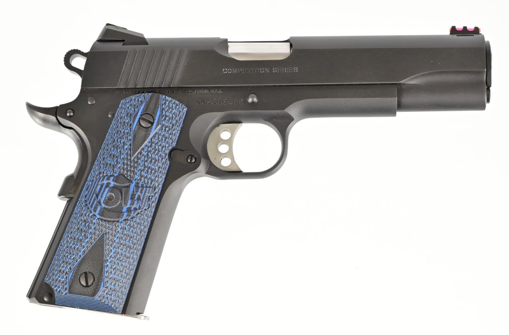 Colt 1911 Government Model .45 ACP: Series 70 Competition Series, 5" barrel, blue finish, custom grips, in original factory case. Modern.