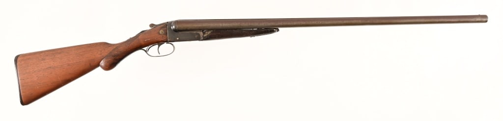Remington 12 Gauge Double Barrel Shotgun: S/N 321625. 30" barrels. Action needs work, stock has been repaired. Modern