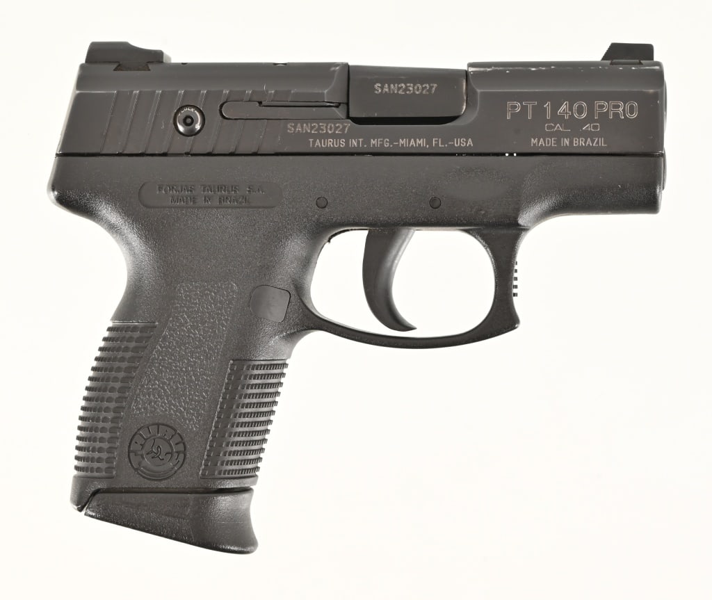 Taurus PT140 Pro .40 Pistol: 3 1/4" barrel, polly frame, Made in Brazil, imported by Taurus INT, MFG - Miami, FL-USA. S/N SAN23027. Modern.