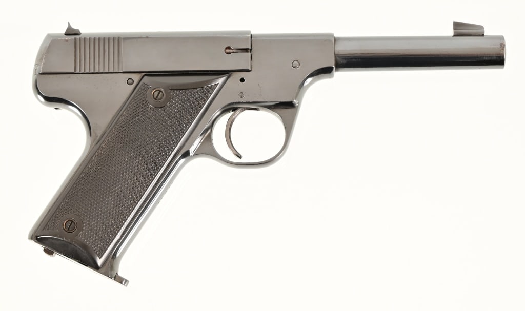 High Standard Model B .22 LR Pistol: 4.5" Barrel, Return Spring Issue, S/N 13661, Has been re-blued at some point. Modern
