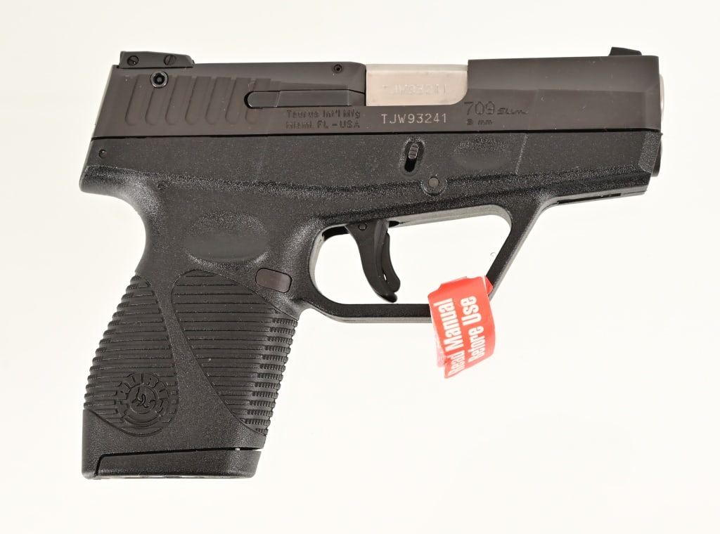 Taurus PT709 Slim 9 MM Pistol (1 of 4)