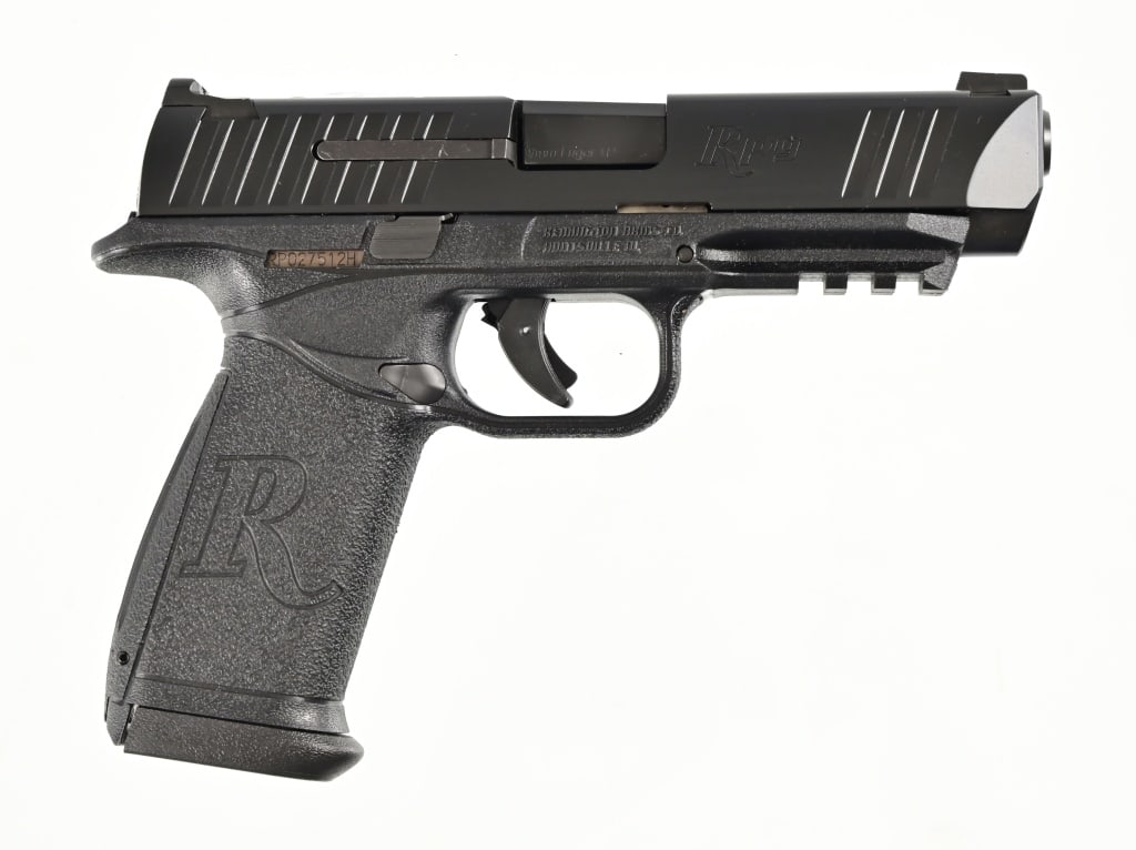 Remington RP9 9mm Pistol: In original factory box. 4 1/2" barrel. 2 Magazines. Modern.