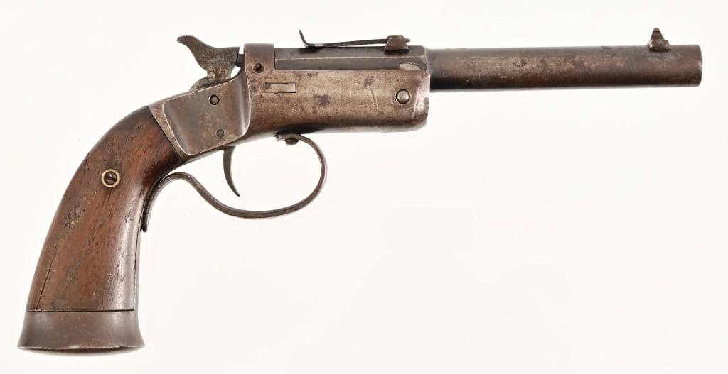 J. Stevens Single Shot .22 Pistol: S/N 6427. Break action .22. Mechanically sound, fair bore. 6" barrel. Modern.