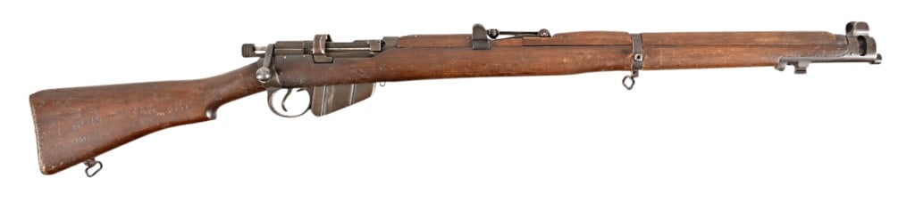 Lithgow Enfield SMLE .303 British Rifle: SN 25489. 25" barrel, bore is dark with visible rifling. Mark III with 1941 date. Stock is marked 1942 with several cartouches. Modern.
