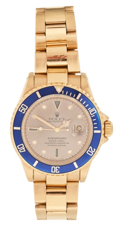 Rolex Submariner Gold & Diamond Date Watch: Rolex Submariner Oyster Perpetual Date Watch 18k gold & diamond 40mm face.