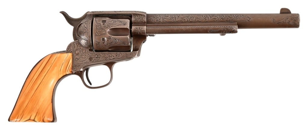 Engraved Colt Model 1873 Single Action Army .45: SN 80745. 7.5" barrel. 1st. model made in 1882. Nice period engraving, working tight action. Period correct bone grips. Antique.