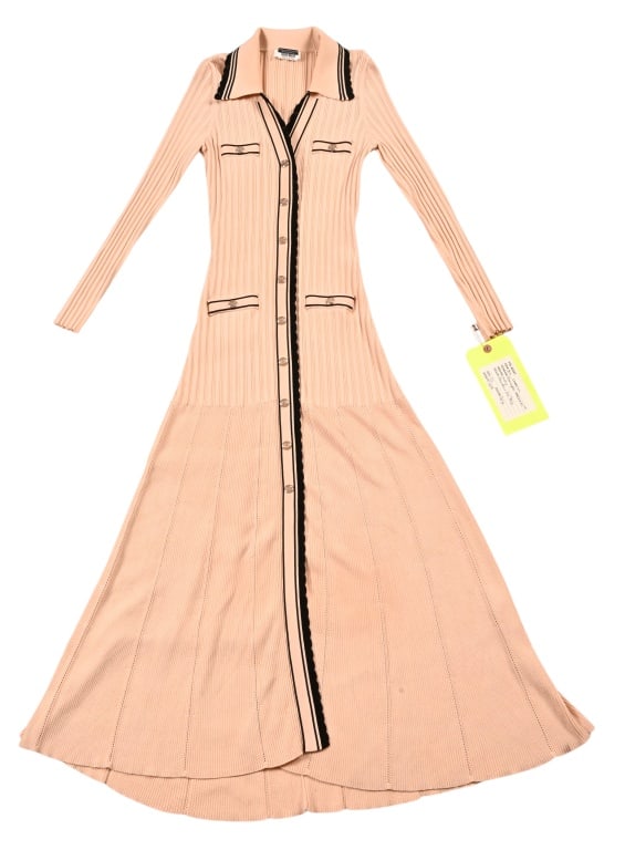 Yellowstone Sarah Atwood Screen Worn Dress: Knit Dress by Sanoro. Size 1/S, Beige. Sarah Atwood is a fictional corporate attorney of the television series Yellowstone, played by Dawn Olivieri.