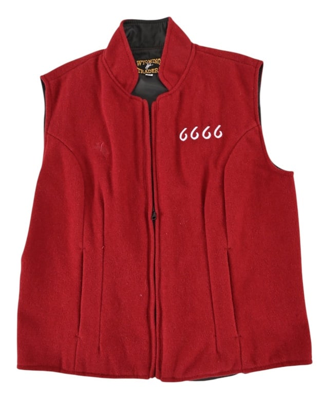 Yellowstone 6666 Prop Insulated Arena Vests (2): Embroidered arena vest from the popular TV series Yellowstone. 6666 embroidered on LH side. (1) Tan Carthartt size S. (1) Red Wyoming Traders size M.