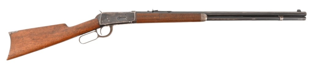 Winchester 1894 Rifle 25-35 Caliber: SN 209434. 26" barrel, bore is dark with visible rifling. Action is solid. Wood is sound with handling marks. Front sight is not original. Made in 1904. Modern.