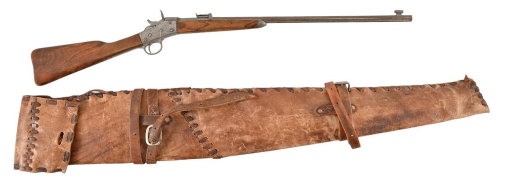 Yellowstone 1923 Remington Rifle Prop & Scabbard: Metal Remington rolling block rifle (non firing) prop in leather scabbard used in the filming of 1923