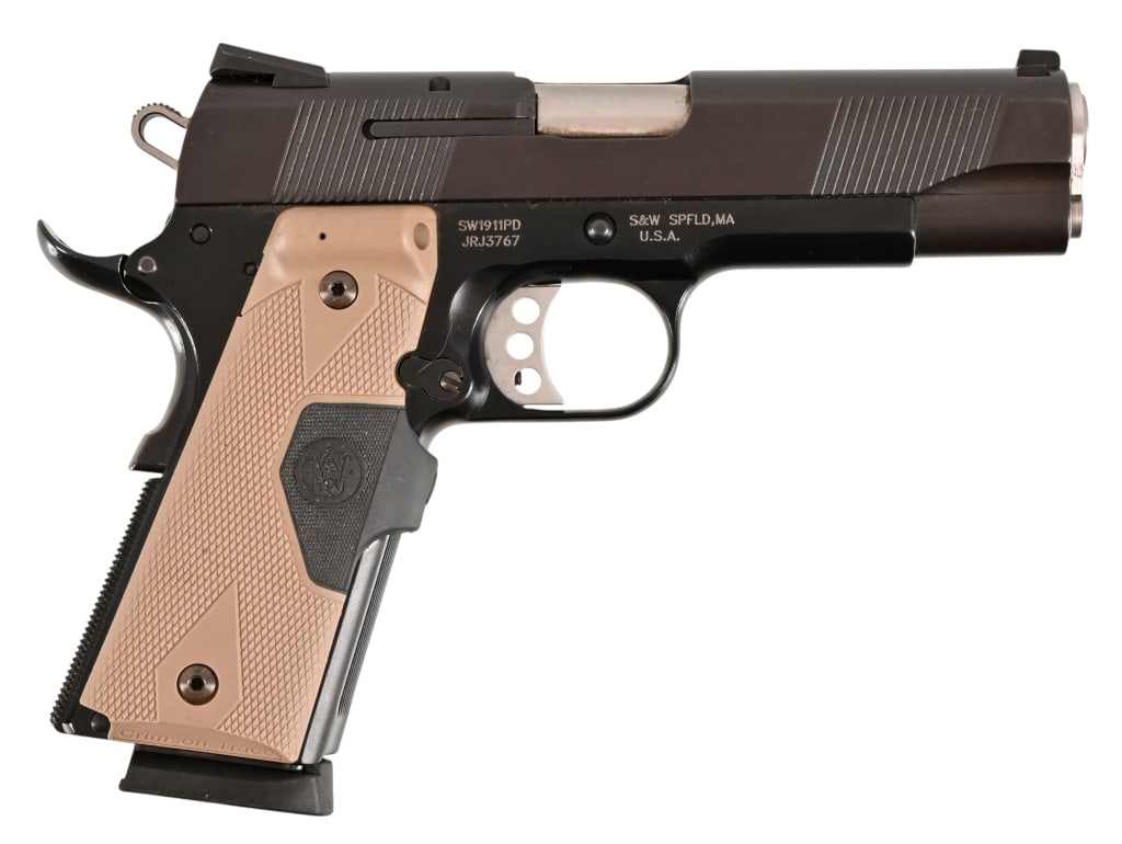 S&W 1911PD .45 ACP Crimson Trace Laser Grips: 4 1/4" barrel, adjustable trigger, like new condition, in original factory hard case. SN: JRJ3767. Modern.