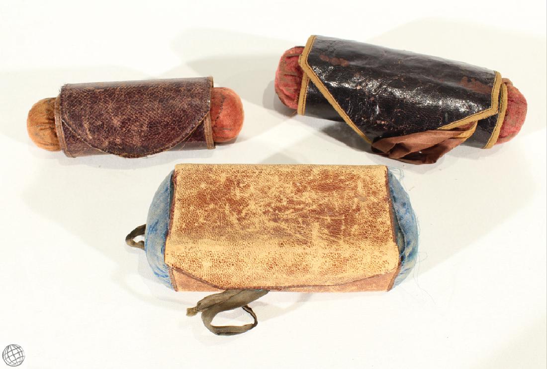 3Pcs Civil War Antique TRAVEL SEWING KIT CASES Leather: Details: This lot consists of 3 portable sewing kit cases from our Civil War Estate Collection. Two of these cases are rolled leather with silk interior and pin cushions on each end. One measures 5.5"