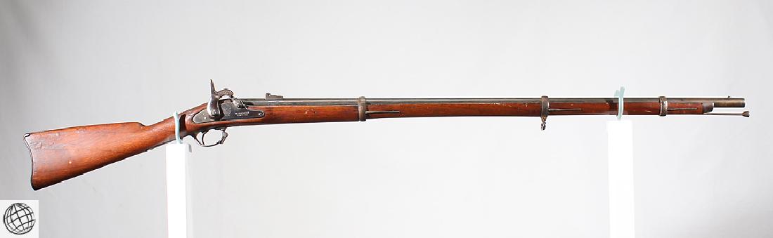 E. Robinson PERCUSSION RIFLED MUSKET Model 1863 New: Details: This Model 1863 percussion rifled musket was made by E. Robinson, New York. The barrel measures approx. 40" and .58 cal. Please attend our live sale to inspect this and many other rare and co