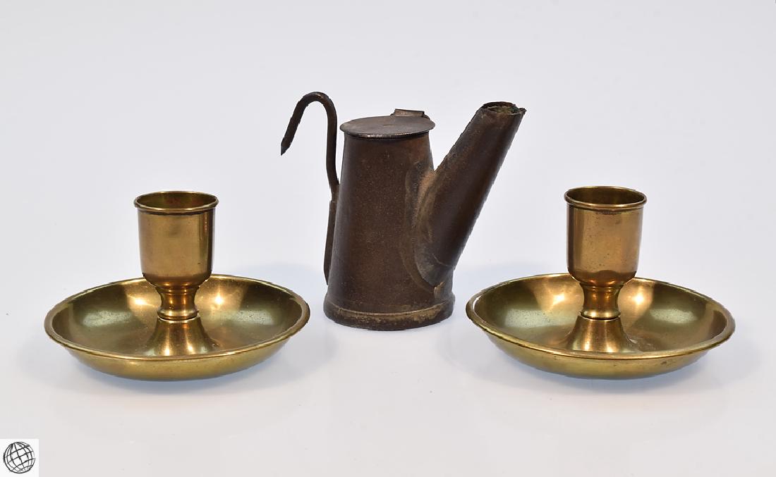 3Pcs. Civil War Era SOLDIERS MINING LIGHTING IMPLEMENTS: Details: This lot consists of an Oil Wick Teapot Lamp and pair of Brighton Bun candle holders from our Civil War Estate Collection. The metal oil and wick torch lamp, commonly referred to as a "Teapot