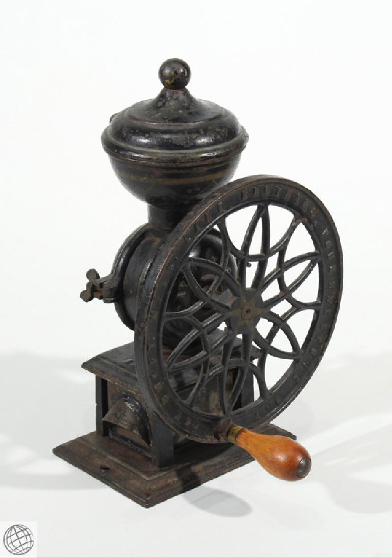 1875 Antique LANE BROTHERS SWIFT MILL COFFEE GRINDER: Details: 1875 antique Lane Brothers Swift Mill coffee grinder. This handsome, well preserved antique coffee mill stands 14" tall by approx. 9" wide. Black cast iron construction, with one wheel operat