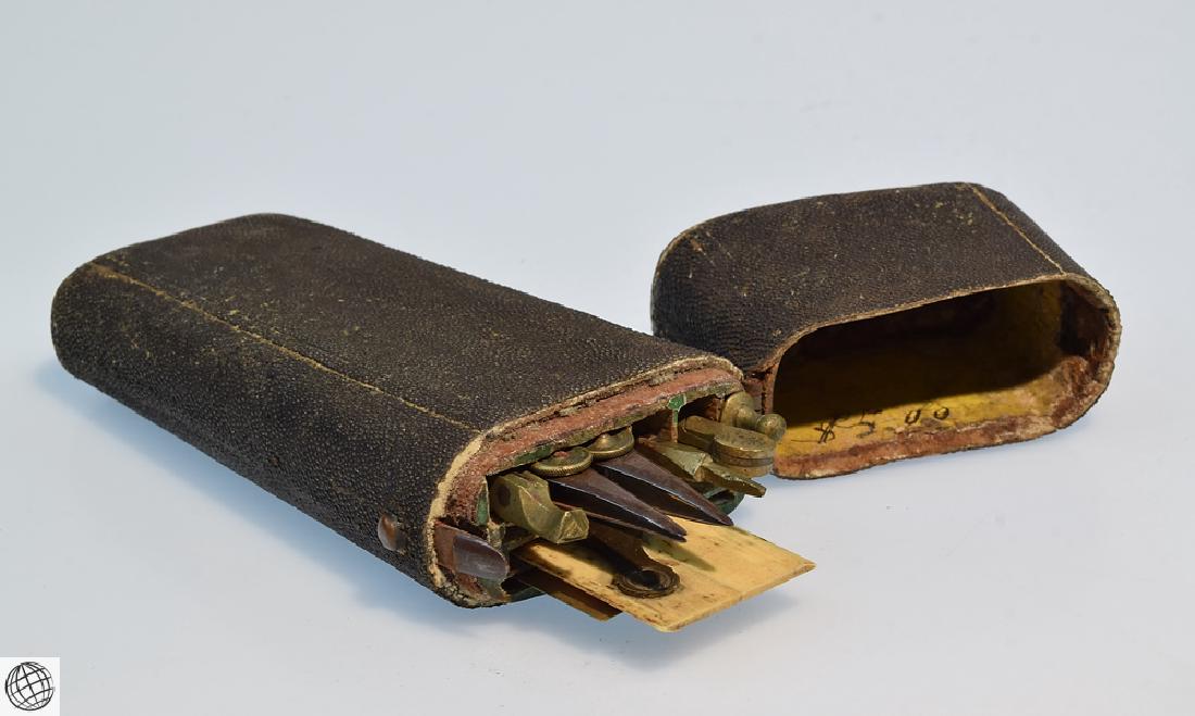Brass ANTIQUE DRAFTING TOOLS SET Sharkskin Case: Details: Antique drafting tools set in sharkskin case. This set contains eight pieces, such as an ivory-colored parallel ruler, protractor, dividers, compass accessories, etc. Brass and steel. Box mea
