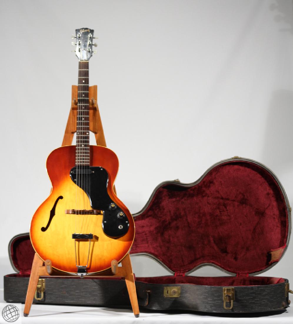 Vintage Archtop Electric Guitar GIBSON ES-120T C1965: Details: This vintage (circa 1965) Gibson ES-120T thinline archtop hollow body electric guitar features a nitrocellulose sunburst finish, single f hole, Melody Maker style pickup mounted on the pickgu
