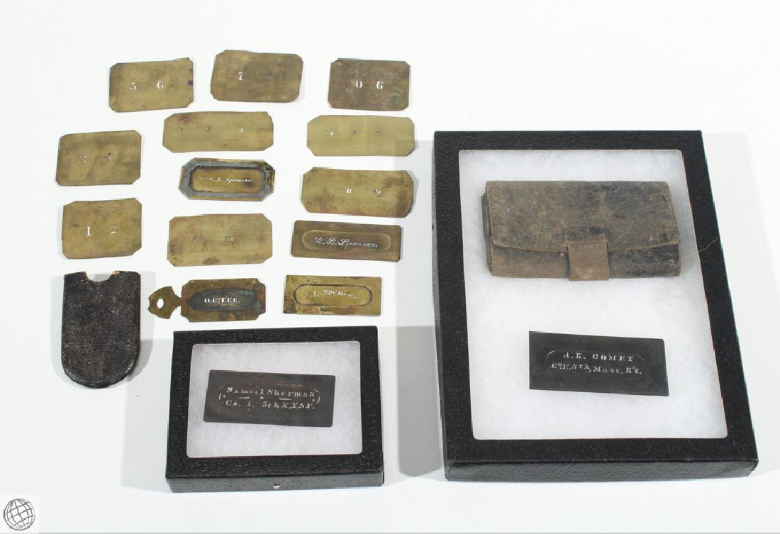 17Pcs Civil War NAME NUMBER STENCILS AND LEATHER WALLET: Details: 17Pcs This lot consists of 6 brass name stencil plates and 9 number stencil plates, along with one antique leather folding wallet, unmarked, found in a shadow box displayed with one of the na