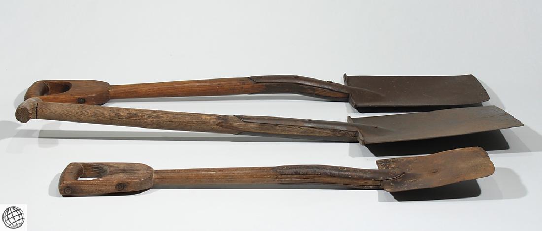 3Pcs Antique Hand Made WOODEN HANDLED IRON SHOVELS: Details: This lot consists of three Antique Shovels from our Civil War Estate Collection.These hand-made shovels feature hardwood handles attached to iron spades. The largest, at approx. 39" long, fe