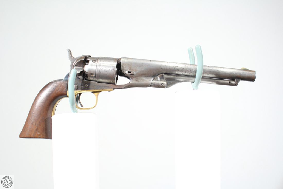 Colt Model 1860 ARMY Inspector Marked New York Address: Details: This Colt Model 1860 Army features an inspector mark on the left grip, New York address, an indentation to base of grip for a shoulder stock, an engraved cylinder, and matching serial numbers