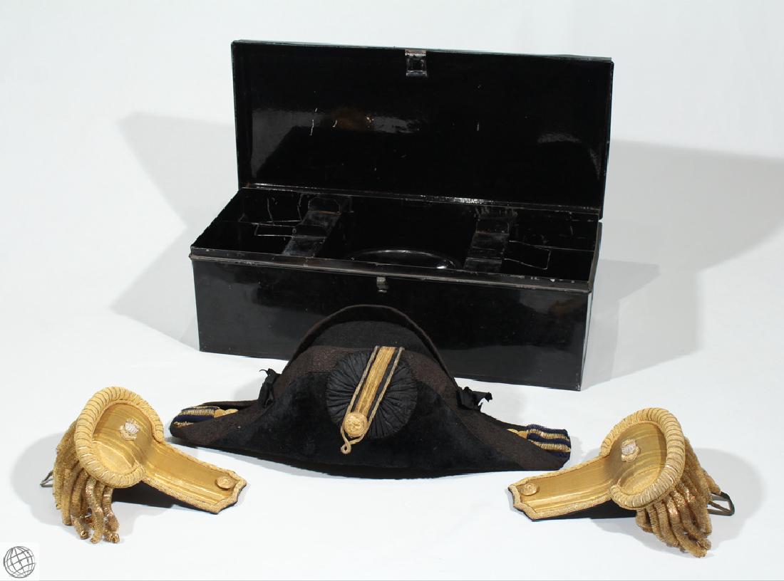 4Pcs Military Formal Dress BICORNE HAT AND EPAULETS c: Details: 4Pcs This lot consists of a bicorne "cocked" hat and gold epaulets in a specially fitted black metal box. The bicorne has a black plush body, black cockade with gold braid and gold button (up