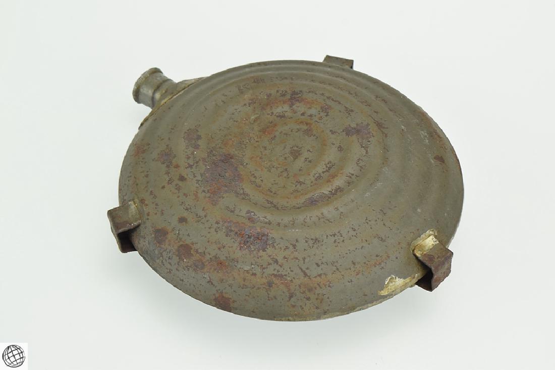 Antique c.1861 CIVIL WAR PERIOD BULLSEYE CANTEEN: Details: Antique Civil War Era bullseye military canteen. This canteen design was popular during the U.S. Civil War, and features the distinctive concentric ring 'bullseye' pattern which began being