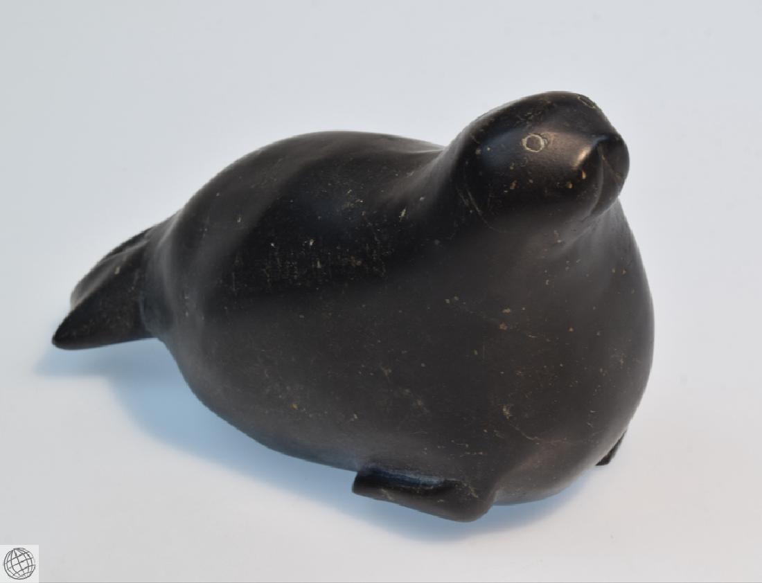 Bart Hanna Seal INUIT CARVING Original Carved Soapstone: Details: This lovely original Inuit soapstone (argitite) sculpture by Bart Hanna of Igloolik was executed in 1989 and originally purchased in 1991 at Galerie Brousseau et Brousseau for $600.00. Bart