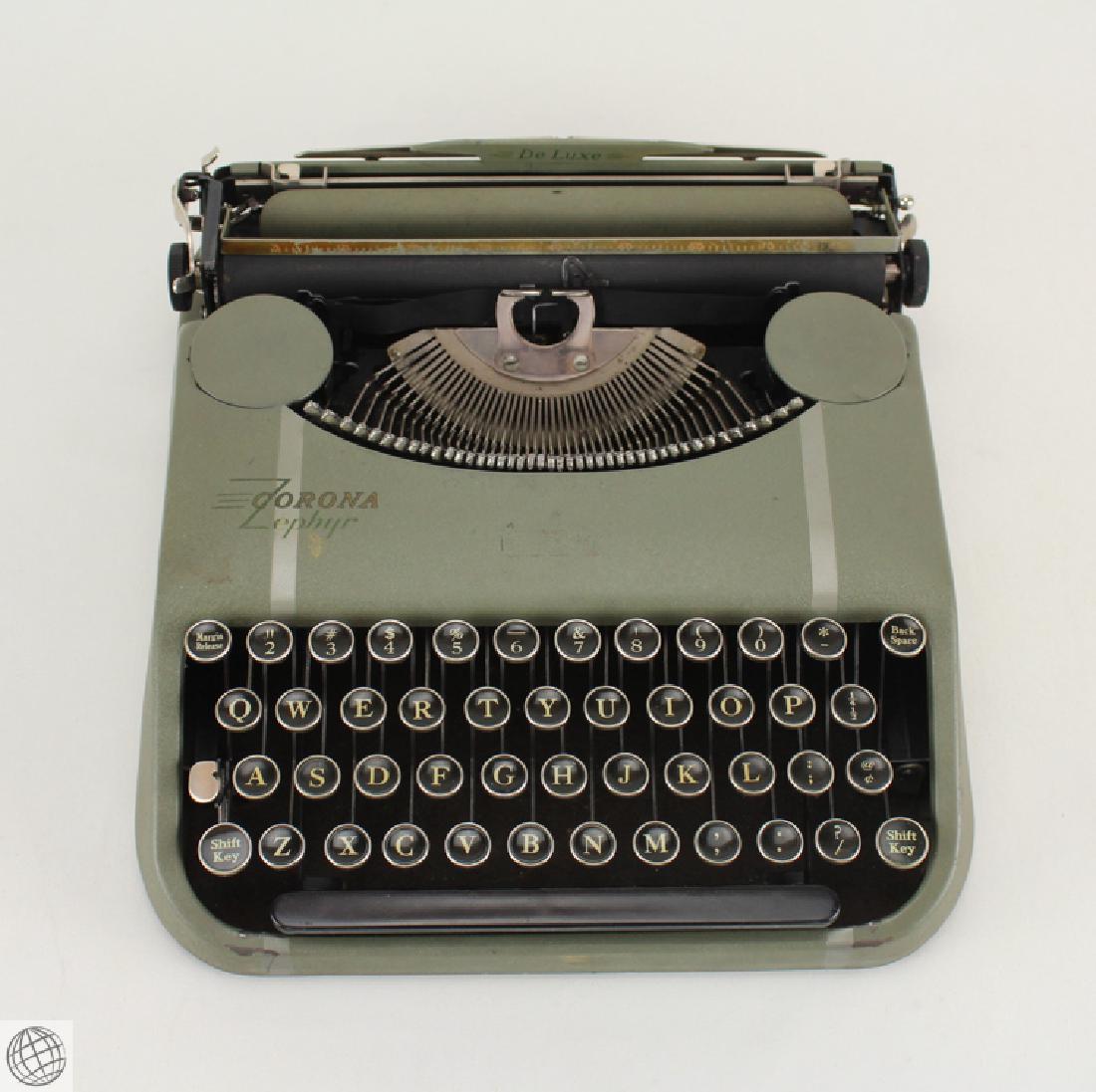 Antique LC SMITH AND CORONA ZEPHYR DELUXE PORTABLE: Details: Antique L.C. Smith & Corona Zephyr Deluxe portable typewriter. This antique typewriter features a handsome olive green exterior, and integrated durable metal case. Serial no. 1Y 9205, presum