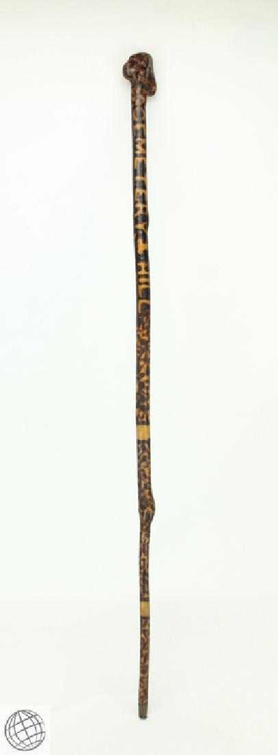 Antique Cemetery Hill DECORATIVELY PYROGRAPHED WOOD: Details: Antique decoratively pyrographed burl wood cane with 'Cemetery Hill' decorated on the shaft. Measures 36" in length. Solid wood can with multiple burls, decorative wood-burned pyrography thro