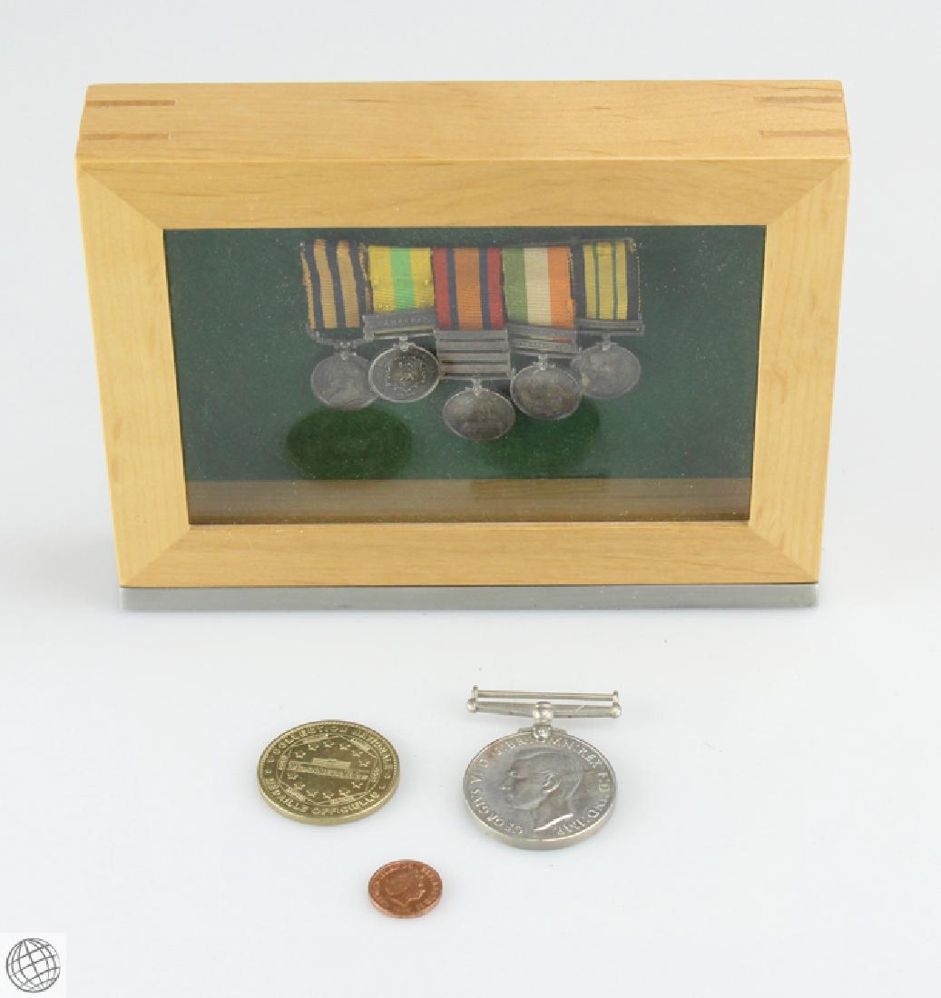 4Pcs Foreign Medallions BRITISH MINI AND FULL MEDALS: Details: 4Pcs This lot consists of vintage military decorations and modern foreign coins. This lot is from the estate of a well-known and well-respected lifetime Civil War collector in Upstate New Yo