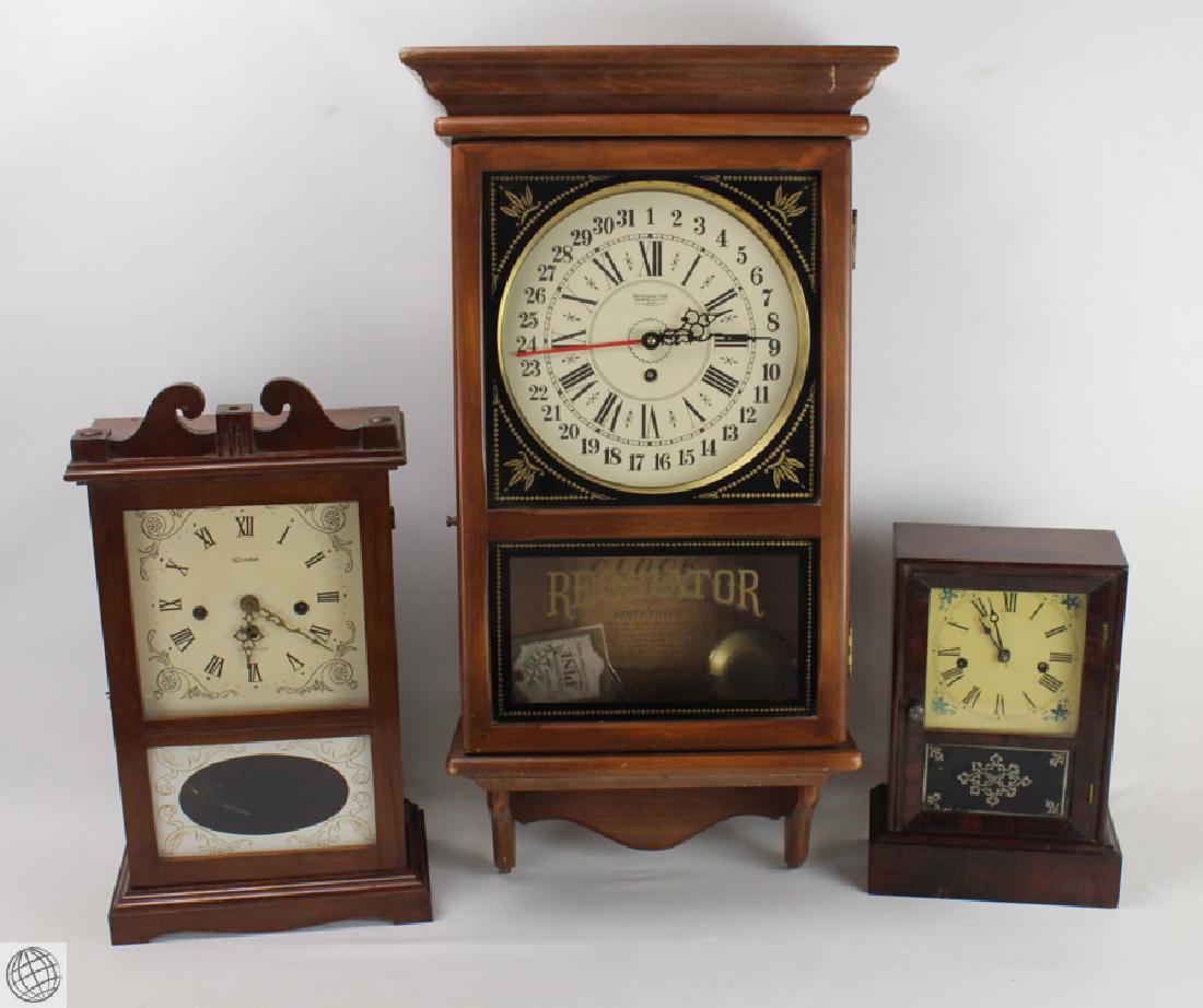 3Pcs Vintage and Antique SELECTION OF DECORATIVE CLOCKS: Details: This lot comprises three vintage and antique clocks. These consist of: A vintage decorative hall clock, by Herschede Hall Clock Company. Westminster chime, Roman numerals. Includes winding k