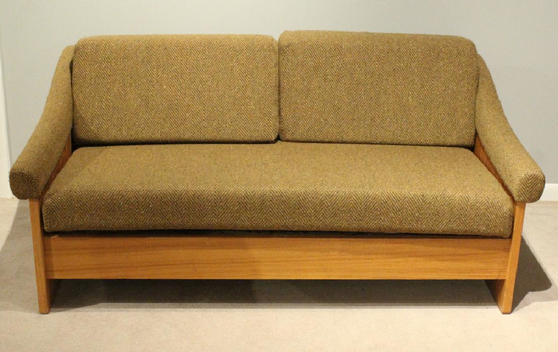 Wool Upholstered SLEEPER COUCH Retro Mid-Century Modern: Details: This sleeper couch is upholstered in wool with a wooden frame. The pullout cushions are supported by three fold-down metal legs, and is easy to set up. The couch cushions and arms feature sim