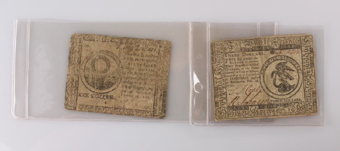 2Pcs American Revolutionary War Era COLONIAL CURRENCY: Details: This lot is comprised of 2 pieces of Colonial currency. A 30 dollar bill dated 1777 and a 3 dollar bill dated 1777. Condition / Notes: This lot shows nicely with expected signs of age and use