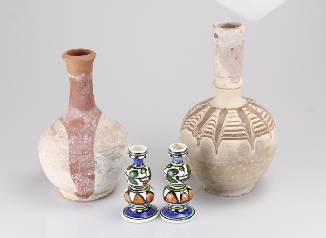 4Pcs Vintage Or Antique CERAMICS VASES CANDLE HOLDERS: Details: This lot consists of 4 pieces of antique or vintage ceramics. 1 matched set of 4" tall candle holders, and 2 rustic vases with red and white glazing, one 11" in Height and the other 9". Cond