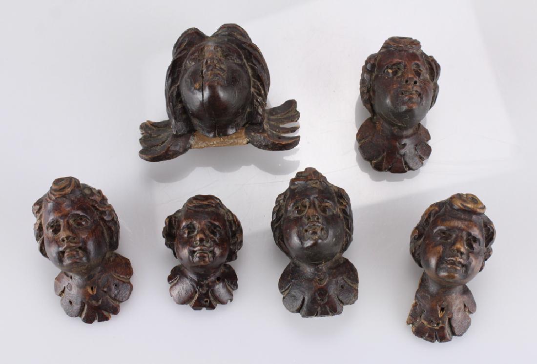6Pcs Italian ANTIQUE CARVED WOOD PUTTI Winged Cherubs: Details: 6Pcs This lot consists of antique Italian style carved wood putti busts, one with wings. Please attend our live sale to inspect these items in person.Size up to: 3.25 x 2.5". Condition / Not