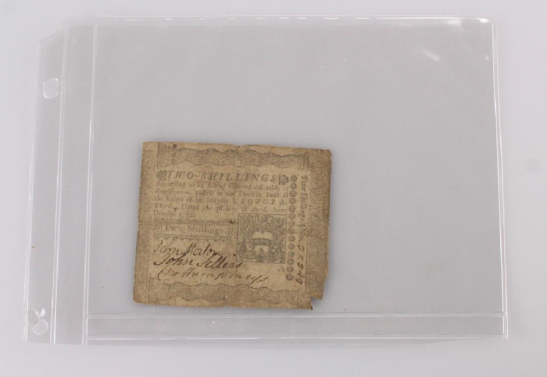 American TWO SHILLING COLONIAL CURRENCY General: Details: This lot is comprised of a Two-Shilling note issued by the General Assembly of Pennsylvania, dated 1772. Condition / Notes: This lot shows nicely with moderate signs of age and wear. Please v