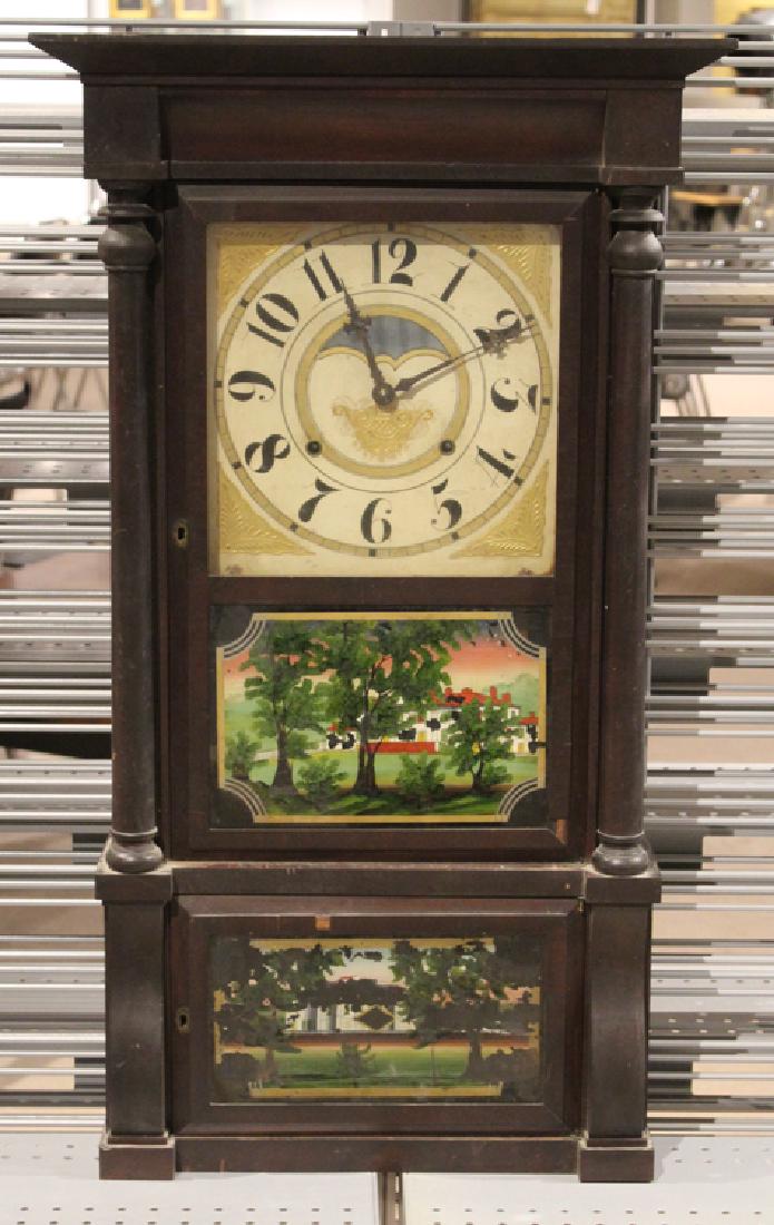 Antique BIRGE MALLOY EIGHT DAY CLOCK Cherry Hardwood: Details: This lot is an antique clock from a local estate. This handsome "Eight Day" picture clock is finely crafted from hardwood by Birge Malloy & Co of Bristol, CT. The clock face and glass doors a