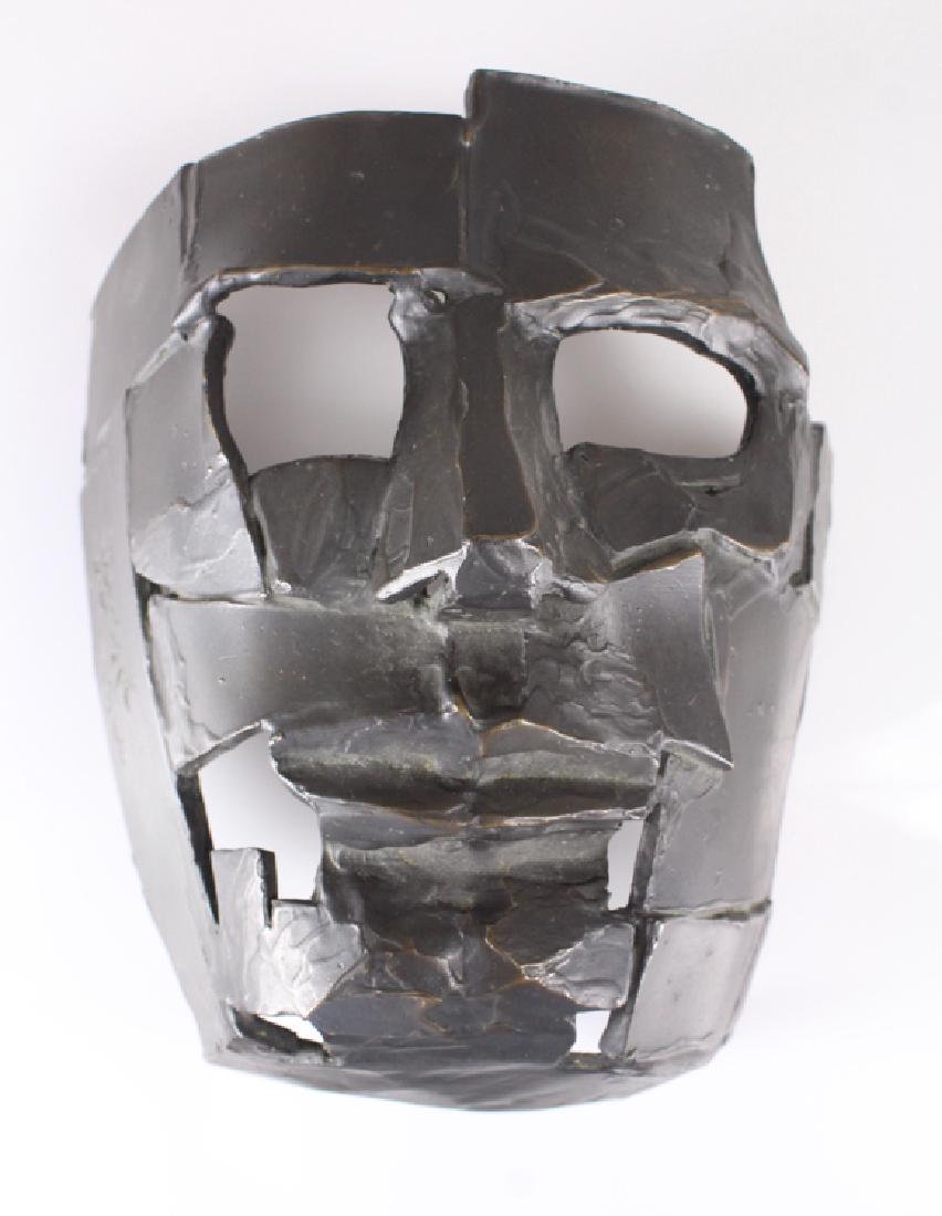 Bronze Mask SALVATORE GRIPPI Vintage Sculpture: Details: This figurative abstract expressionist bronze face mask was created by artist Salvatore Grippi. The piece measures 7.5'' x 8'' x 4''. Grippi (b. 1921), an important member of the New York Sch