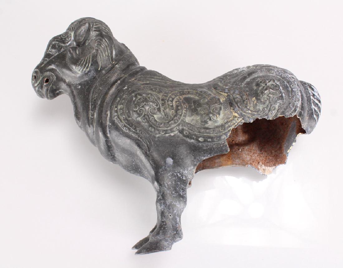 Antique Asian METAL RAM STATUE FRAGMENT C 1600 Heavily: Details: This lot comprises an Asian metal ram statue fragment c. 1600. The partial cast is heavily decorated with raised scroll and beast figures. The piece is hollow with terracotta residue inside t