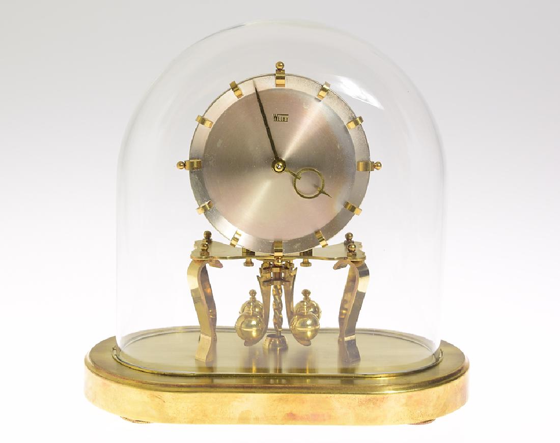 Collectible Torsion Clock VINTAGE WELBY OVAL STYLE: Details: Collectible Torsion Clock VINTAGE WELBY OVAL STYLE 400-DAY CLOCK BY KUNDO 1965 Excellent Condition Functional W/ Original Key Pendulum Lock Maker: Welby by Kieninger & Obergfell History of Ma