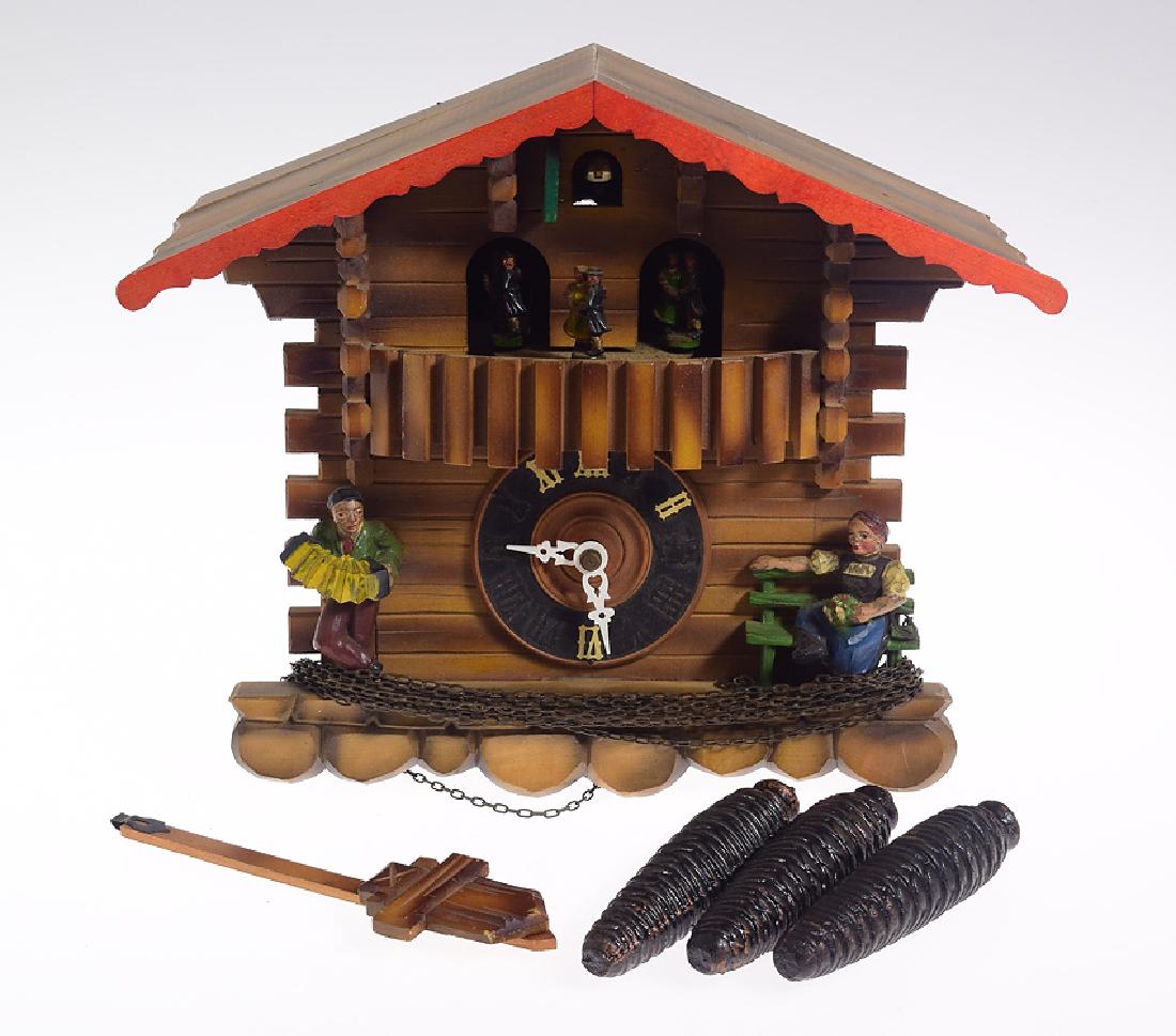 Decorative Cuckoo Clock GERMAN BLACK FOREST CUCKOO: Details: Decorative Cuckoo Clock GERMAN BLACK FOREST CUCKOO CLOCK SPINNING DANCERS & MUSIC BOX c1958 Hand Carved Original One-Day Clock Maker: Unknown History of Maker: N/A Country of Origin: Germ