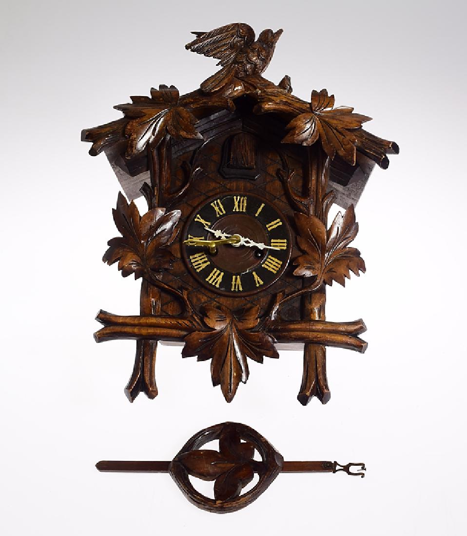 German Cuckoo Clock JUNGHANS ANTIQUE EARLY 20TH CENTURY: Details: German Cuckoo Clock JUNGHANS ANTIQUE EARLY 20TH CENTURY BLACK FOREST FRONT WINDING CUCKOO CLOCK & KEY Hand Carved Collectible Maker: Junghans History of Maker: Junghans was first established 
